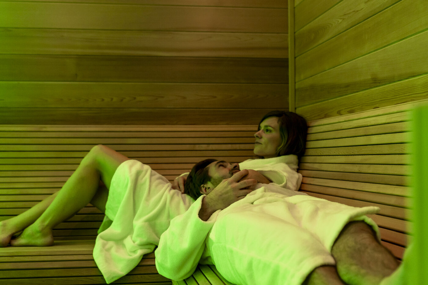 Couple relaxing in the sauna