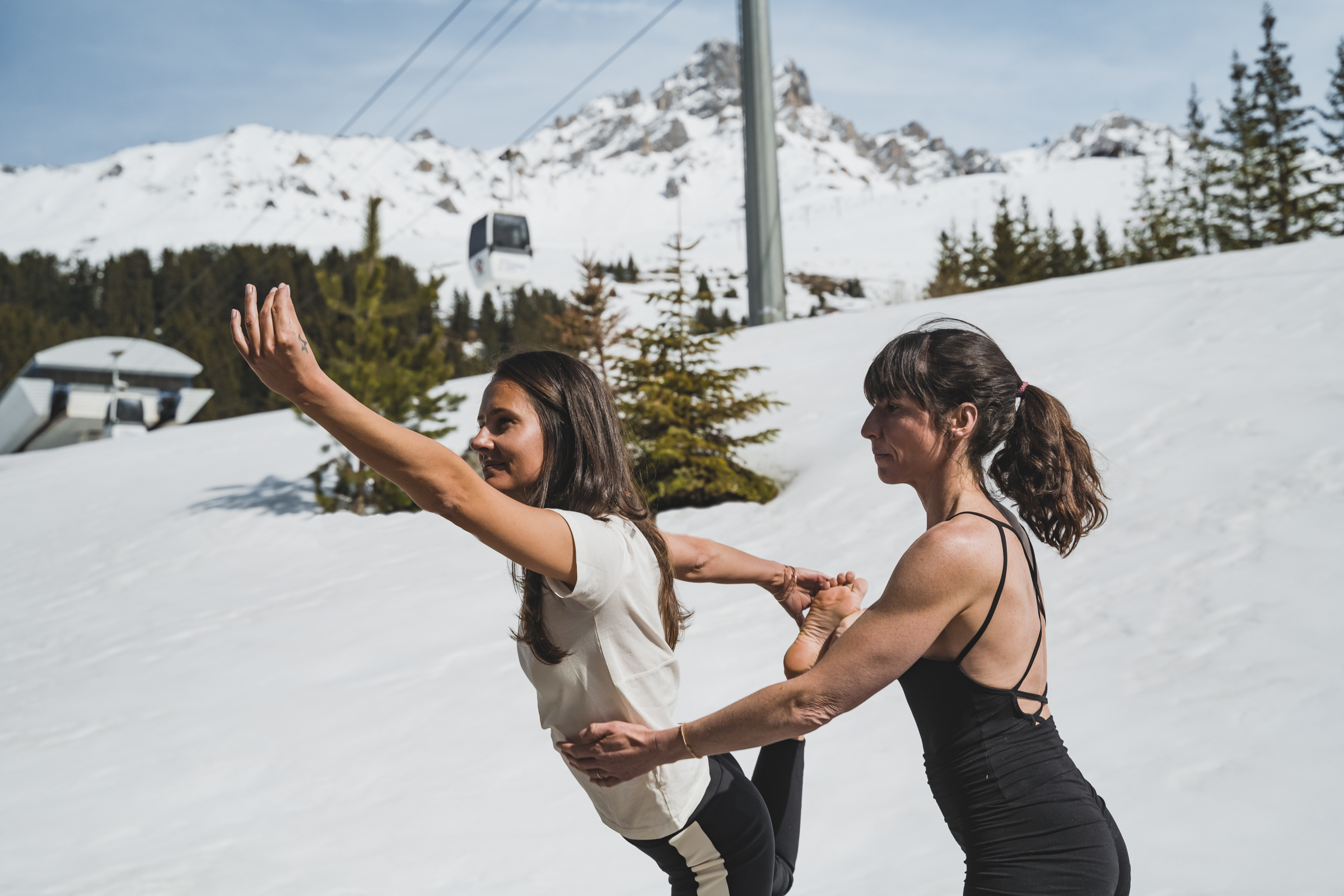 Guided yoga session on the mountain, part of the Active Life Plan
